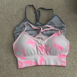 2 pro fit sports bras , 1 camo size small and one pink tie die size small